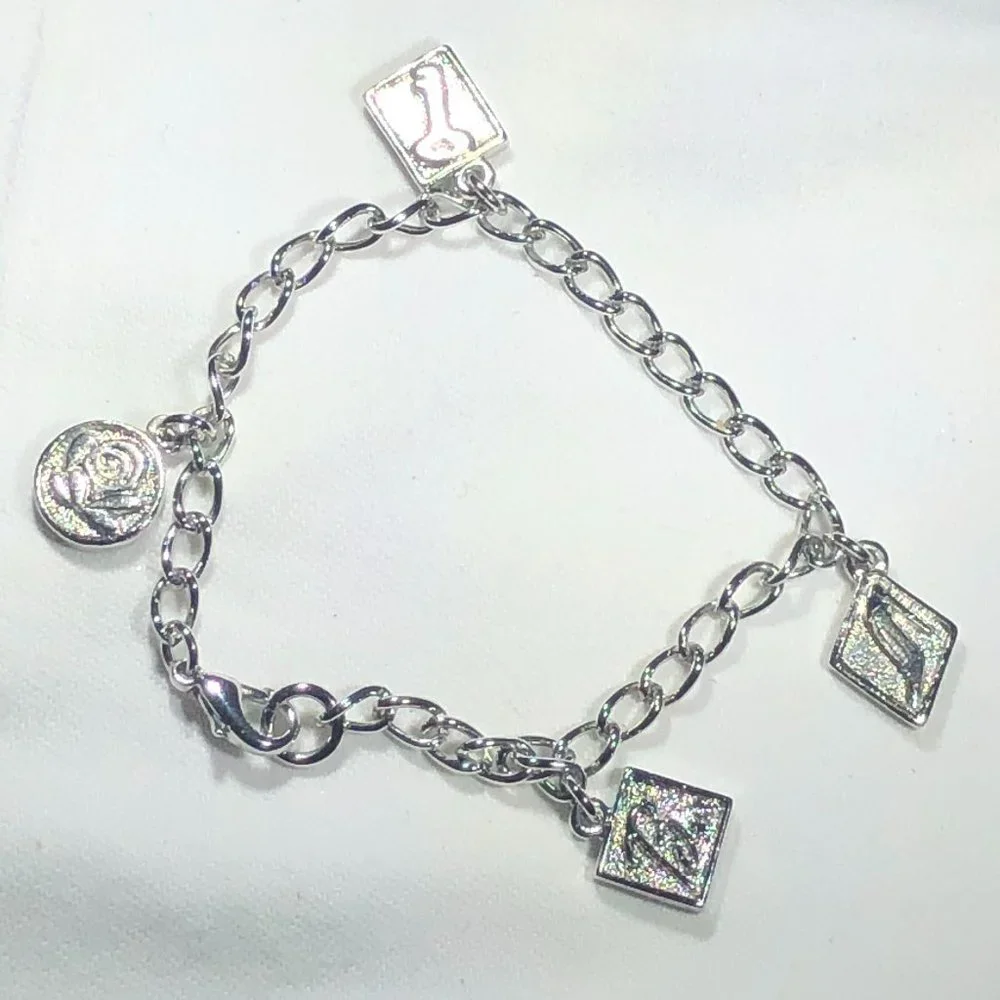 SILVER TONE BARBIE CHARM BRACELET